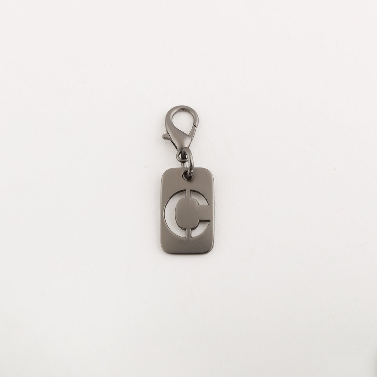 Carpisa Crna Gora – Milo pendant go - Charm – Gunmetal – AAD79403546 – Image 1